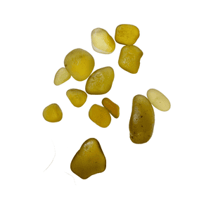 amber sea glass on white background
